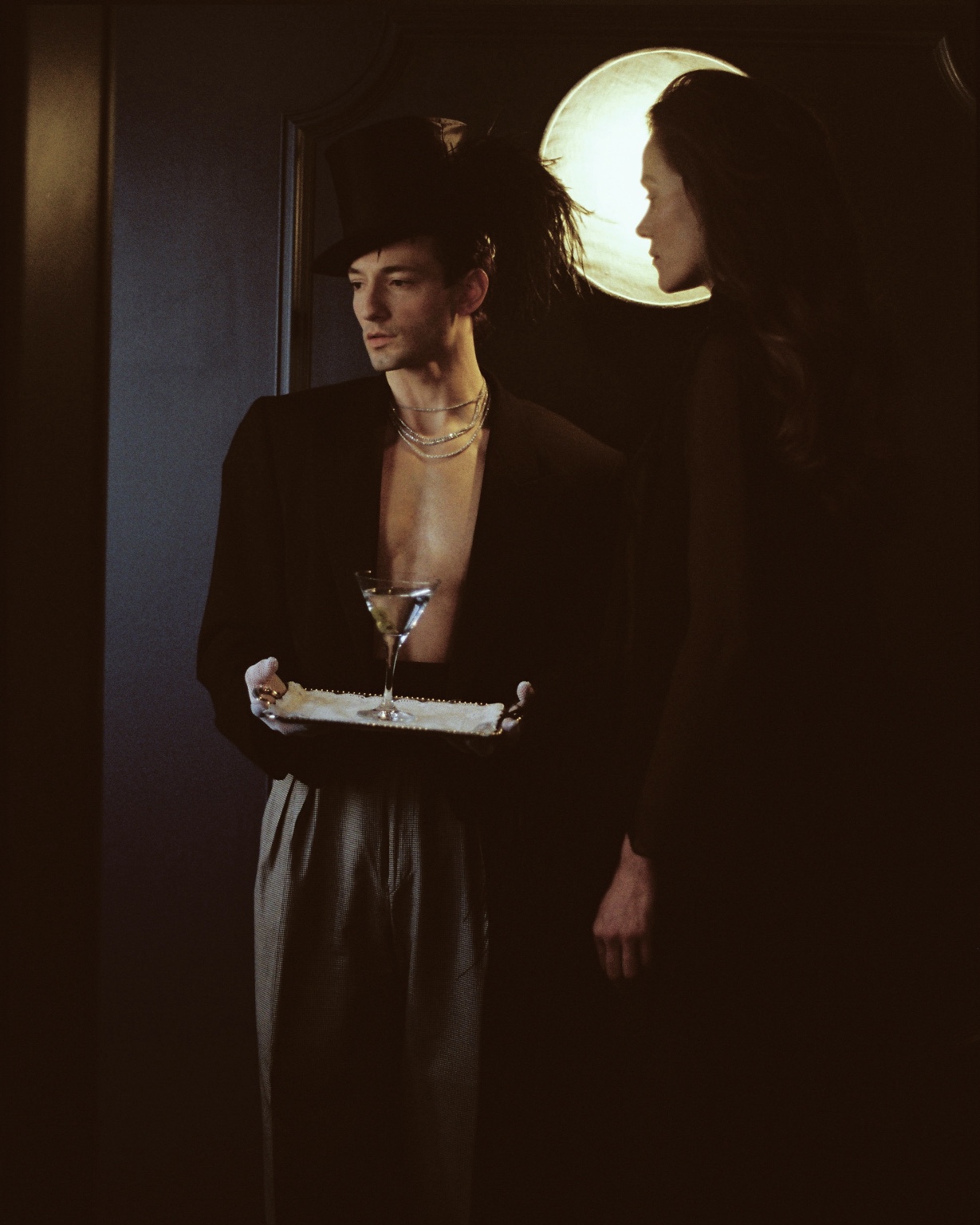 The butler holding a tray